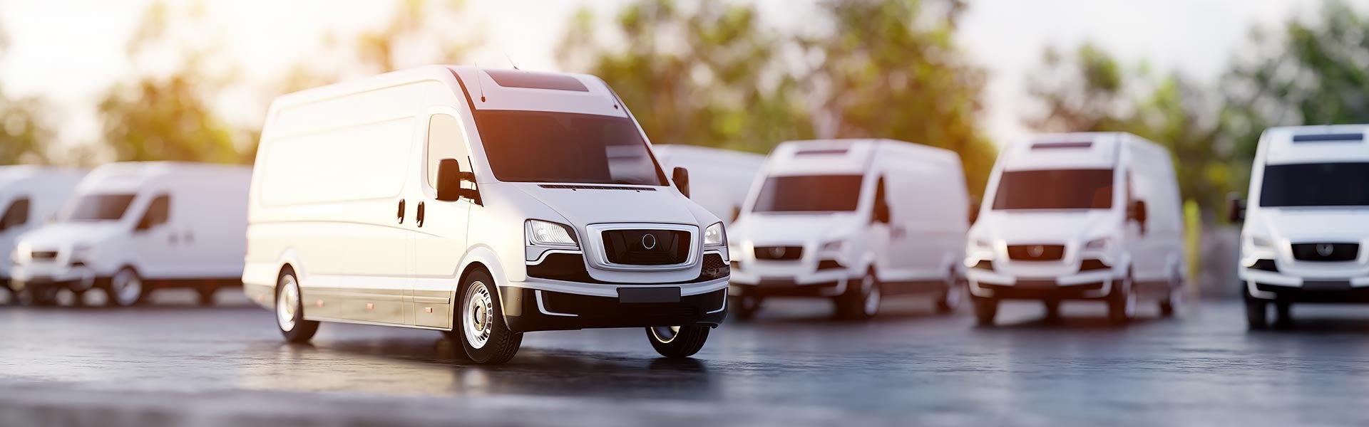 commercial vans parked in parking